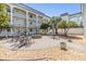 Inviting outdoor courtyard with seating areas and landscaping for residents to enjoy at 4801 Airport Rd # 214, Zephyrhills, FL 33542