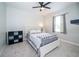 Bright and airy bedroom with a comfortable bed, offering a peaceful and relaxing atmosphere at 4810 Diamonds Palm Loop, Wesley Chapel, FL 33543