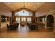 Open concept floor plan with abundant natural light, creating an inviting atmosphere at 4810 Diamonds Palm Loop, Wesley Chapel, FL 33543