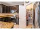 Well-organized walk-in pantry offers ample shelving for storage and food organization at 4810 Diamonds Palm Loop, Wesley Chapel, FL 33543