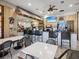 Community bar with ample seating, televisions, and an open, airy design at 525 Manns Harbor Dr, Apollo Beach, FL 33572