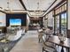 Comfortable lounge area offering a serene ambiance with decorative chandeliers and wood trim at 525 Manns Harbor Dr, Apollo Beach, FL 33572
