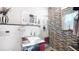 Modern bathroom with sleek fixtures, patterned tile, and a floating vanity at 6014 Luana S Ln, Gulfport, FL 33707