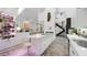 Modern kitchen features a large island, custom cabinets, marble flooring, and a unique vertical garden wall feature at 6014 Luana S Ln, Gulfport, FL 33707
