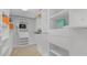 Spacious wardrobe offering ample storage, shelving, and hanging space, designed for organization at 6014 Luana S Ln, Gulfport, FL 33707