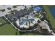An aerial view of the community's pool and lounge area, and other outdoor activities at 6759 Michael Favor Way, Wesley Chapel, FL 33545