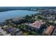 Attractive aerial view capturing condo living with a beautiful pond, pool, and scenic neighborhood at 7903 Seminole Blvd # 2103, Seminole, FL 33772