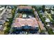 Aerial shot showcasing the condo buildings, community pool, and covered parking spaces at 7903 Seminole Blvd # 2103, Seminole, FL 33772