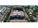 Scenic aerial view of lakeside community with a pool and water feature near the condo buildings at 7903 Seminole Blvd # 2103, Seminole, FL 33772