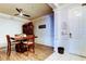 Dining room with stylish ceiling fan, and modern decor with a wooden dining table at 7903 Seminole Blvd # 2103, Seminole, FL 33772