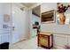 Hallway with tiled floors and view of the kitchen at 7903 Seminole Blvd # 2103, Seminole, FL 33772