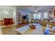 Relaxing living room featuring hardwood floors and a ceiling fan at 7903 Seminole Blvd # 2103, Seminole, FL 33772