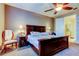 Well-appointed bedroom with a queen-sized bed, soft lighting, and carpet floors, creating a cozy and inviting space at 7903 Seminole Blvd # 2103, Seminole, FL 33772