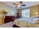 Cozy bedroom featuring a large bed, stylish furnishings, and a bright window, creating a peaceful retreat at 7903 Seminole Blvd # 2103, Seminole, FL 33772
