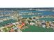 Breathtaking aerial view of a waterfront home boasting a dock and scenic bay views in a sought-after community at 8014 12Th S Ave, St Petersburg, FL 33707