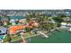 Waterfront home with a private boat dock, swimming pool, and tropical landscaping at 8014 12Th S Ave, St Petersburg, FL 33707
