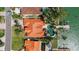 Aerial view of waterfront home with a private pool and dock at 8014 12Th S Ave, St Petersburg, FL 33707