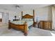 Traditional bedroom with wooden furniture, lamps, and bedside tables at 8014 12Th S Ave, St Petersburg, FL 33707