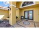 Inviting front porch with tiled flooring, decorative accents, and a cozy seating area at 8014 12Th S Ave, St Petersburg, FL 33707