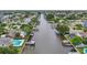 Scenic aerial view of a tranquil canal neighborhood with private boat docks and lush landscaping at 8439 Boxwood Dr, Tampa, FL 33615