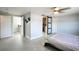 Primary bedroom with ensuite bathroom and walk-in closet behind sliding door at 8439 Boxwood Dr, Tampa, FL 33615