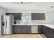Updated kitchen featuring stainless steel appliances, modern cabinetry, and ample counter space at 8439 Boxwood Dr, Tampa, FL 33615