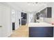 Modern kitchen with sleek cabinetry, stainless steel appliances, and an open layout at 8439 Boxwood Dr, Tampa, FL 33615