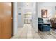 Hallway view to the kitchen and living room in an open-concept living space at 9069 Gaynor St, Spring Hill, FL 34608