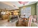 The eat-in kitchen offers stainless appliances, stone countertops, and bar seating at 10003 Vista Pointe Dr, Tampa, FL 33635