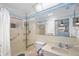 Bathroom featuring shower, toilet, sink and grab bars at 10155 36Th N Way, Pinellas Park, FL 33782