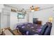 Bedroom featuring ceiling fan, closet, and TV at 10155 36Th N Way, Pinellas Park, FL 33782