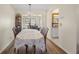 Bright dining room featuring a chandelier, adjacent to the kitchen and living area at 10155 36Th N Way, Pinellas Park, FL 33782