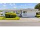 Charming single-story home featuring a well-manicured lawn and a one-car garage at 10155 36Th N Way, Pinellas Park, FL 33782
