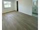 Bright bedroom with a large window and views at 11241 Temple Ct, Seminole, FL 33772