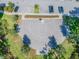 Aerial view of a community basketball court featuring benches, parking, landscaping, and nearby sidewalks at 11862 Frost Aster Dr, Riverview, FL 33579