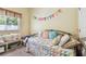 Cozy bedroom featuring twin daybed, and carpet at 11862 Frost Aster Dr, Riverview, FL 33579