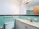 Bright bathroom with a single sink vanity and tiled shower at 13116 N Oregon Ave, Tampa, FL 33612