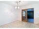 Bright dining room with tile flooring and sliding glass doors at 13116 N Oregon Ave, Tampa, FL 33612