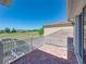 Enjoy beautiful golf course views from this private brick balcony at 13143 Palmilla Cir, Dade City, FL 33525