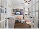 Cozy Bedroom filled with natural light showcases a crib, rocking chair, and charming decorations at 1410 25Th N St, St Petersburg, FL 33713
