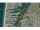 Aerial view of neighborhood, intercoastal waterway, and beach in a desirable location at 14115 Harborwood Dr, Largo, FL 33774