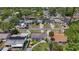 Aerial view of home showing the roof, small patio and surrounding neighborhood at 1734 Shore Acres Ne Blvd, St Petersburg, FL 33703