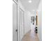 Bright hallway with hardwood floors leading to an open living space with natural light at 175 1St S St # 1003, St Petersburg, FL 33701