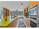 Contemporary kitchen boasts stainless appliances, ample counter space, and city views from the window at 175 1St S St # 1003, St Petersburg, FL 33701