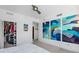 Spacious bedroom features ample closet space and minimalist design with a colorful art piece at 175 1St S St # 1003, St Petersburg, FL 33701