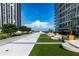 Luxurious rooftop deck with comfortable seating, lush landscaping, and city views at 175 1St S St # 1003, St Petersburg, FL 33701