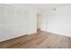 Bedroom with closet, hardwood floors and door at 201 Laurel # 308, Tampa, FL 33602