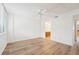 Bright bedroom with hardwood floors and ceiling fan at 201 Laurel # 308, Tampa, FL 33602