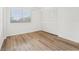 Bedroom with window, hardwood floors and closet at 201 Laurel # 308, Tampa, FL 33602