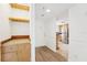 Light and airy entryway features wood floors, wooden cabinets and view to the kitchen at 201 Laurel # 308, Tampa, FL 33602